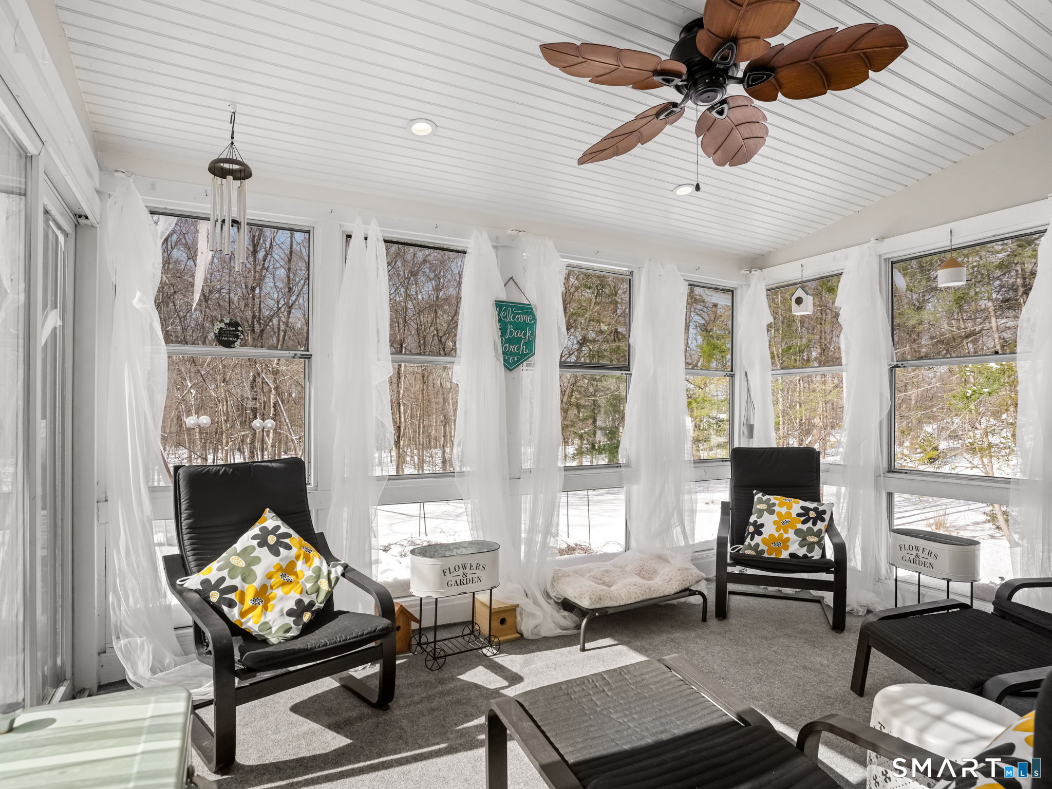 16 Deepdene Road Trumbull, CT 06611 - Photo 12 of 25 a living room with furniture and large windows