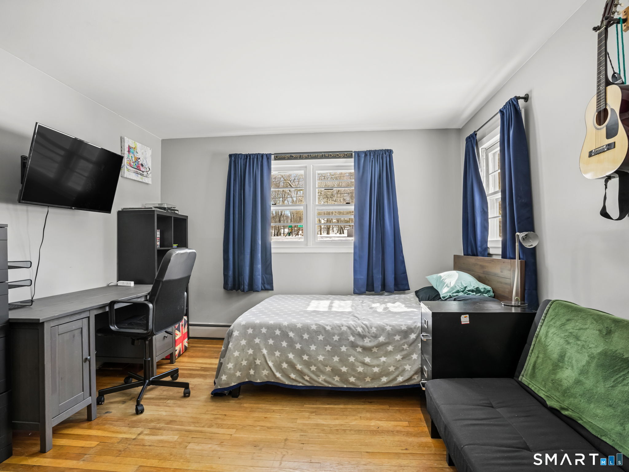 16 Deepdene Road Trumbull, CT 06611 - Photo 15 of 25 a bedroom with a bed and a flat screen tv