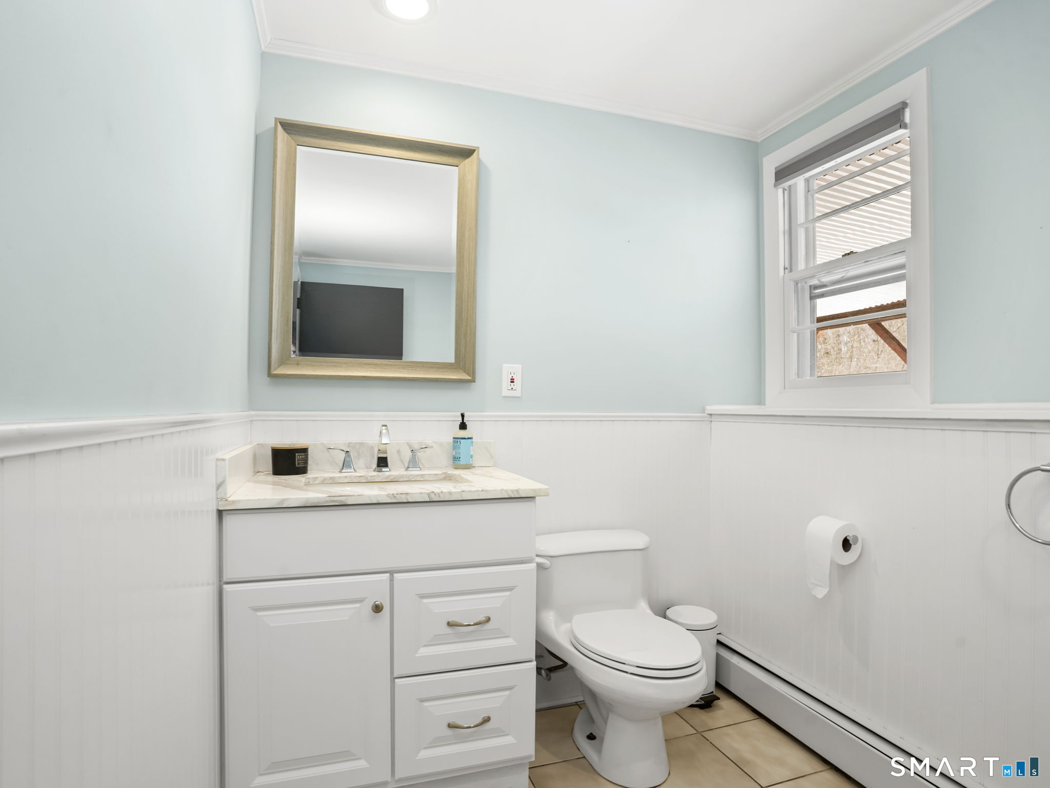 16 Deepdene Road Trumbull, CT 06611 - Photo 18 of 25 a bathroom with a toilet sink and mirror