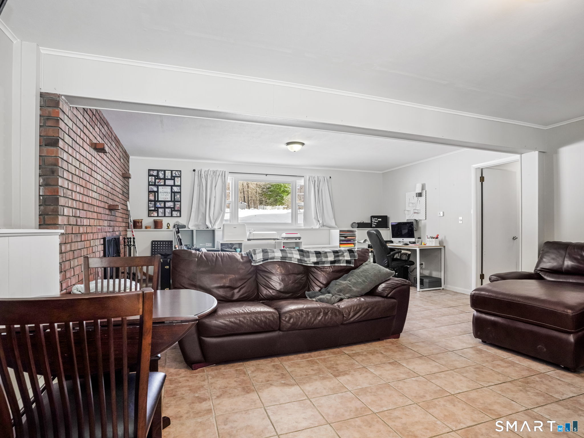 16 Deepdene Road Trumbull, CT 06611 - Photo 21 of 25 a living room with furniture and a window