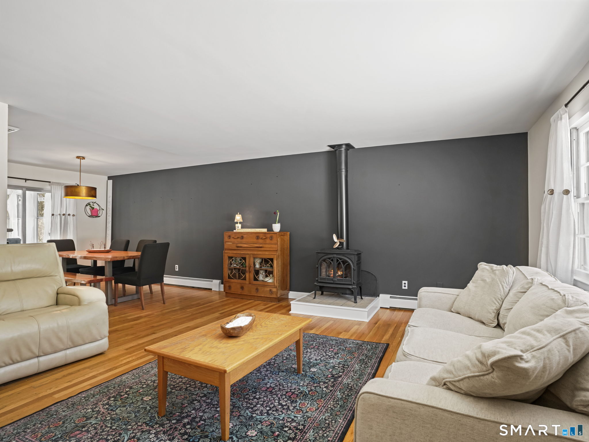 16 Deepdene Road Trumbull, CT 06611 - Photo 3 of 25 a living room with furniture and a table