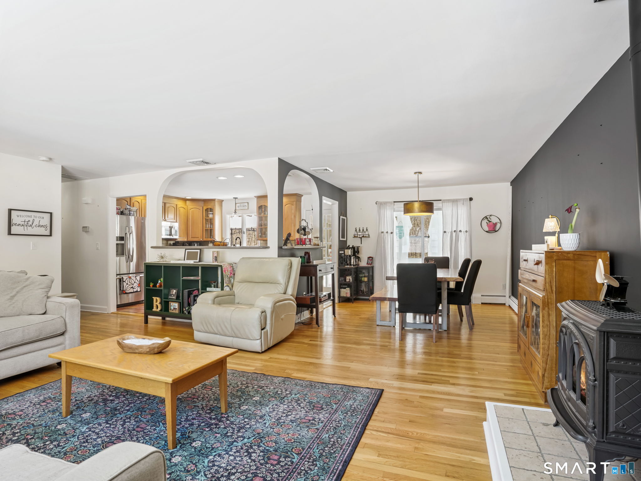 16 Deepdene Road Trumbull, CT 06611 - Photo 5 of 25 a living room with furniture and a table