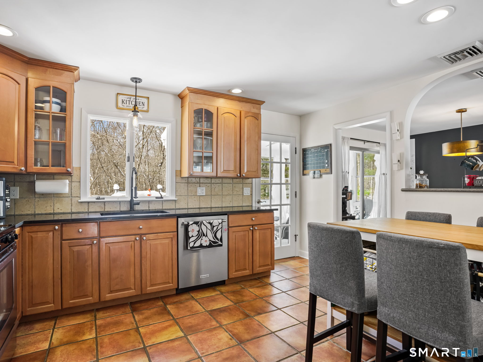 16 Deepdene Road Trumbull, CT 06611 - Photo 10 of 25 a large kitchen with granite countertop a sink and cabinets