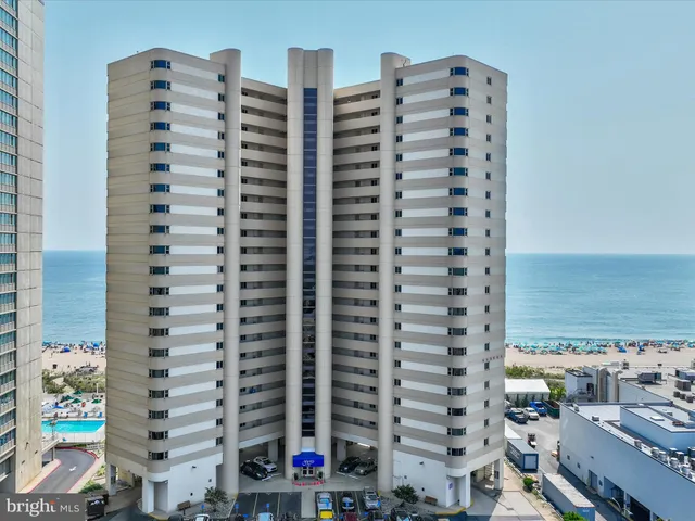 a front view of a building with a garage