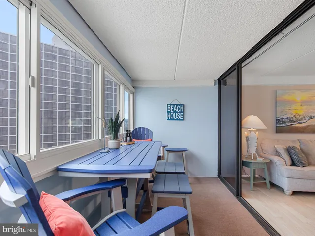 a kitchen with a refrigerator and a stove