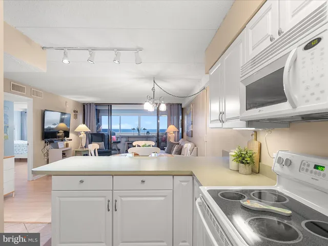 a bedroom with a bed and a cabinets