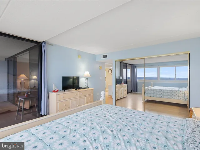 a view of a swimming pool with an ocean view