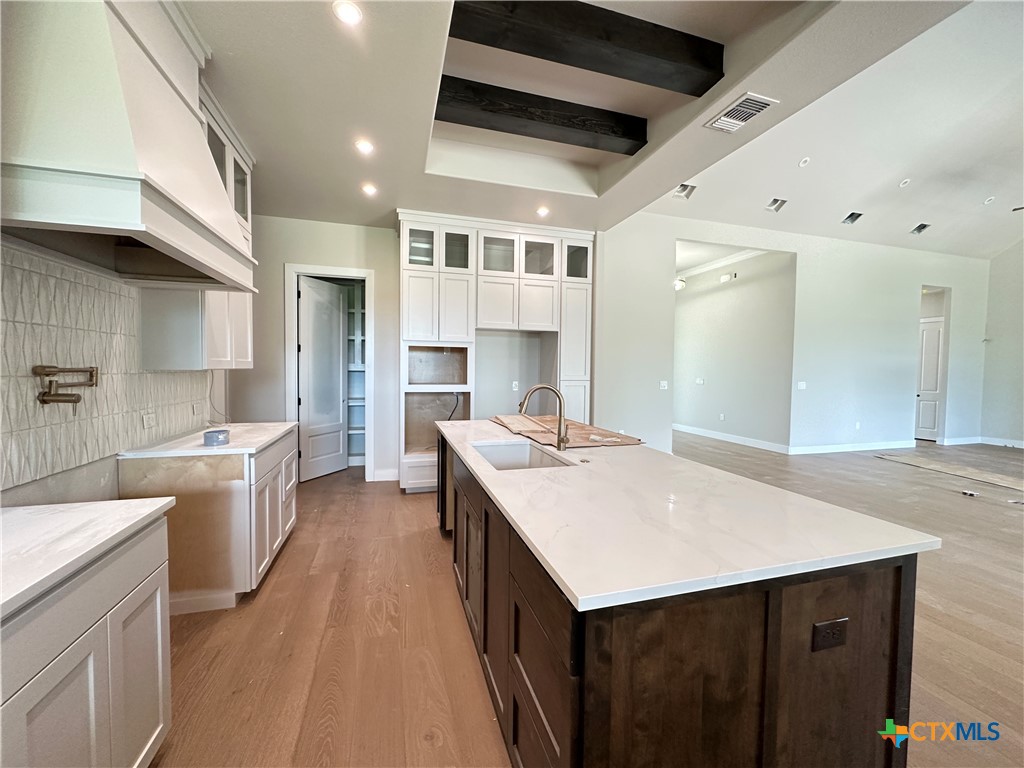 418 Dos Rios Drive Belton, TX 76513 - Photo 6 of 41 a large kitchen with kitchen island a sink a stove and a refrigerator