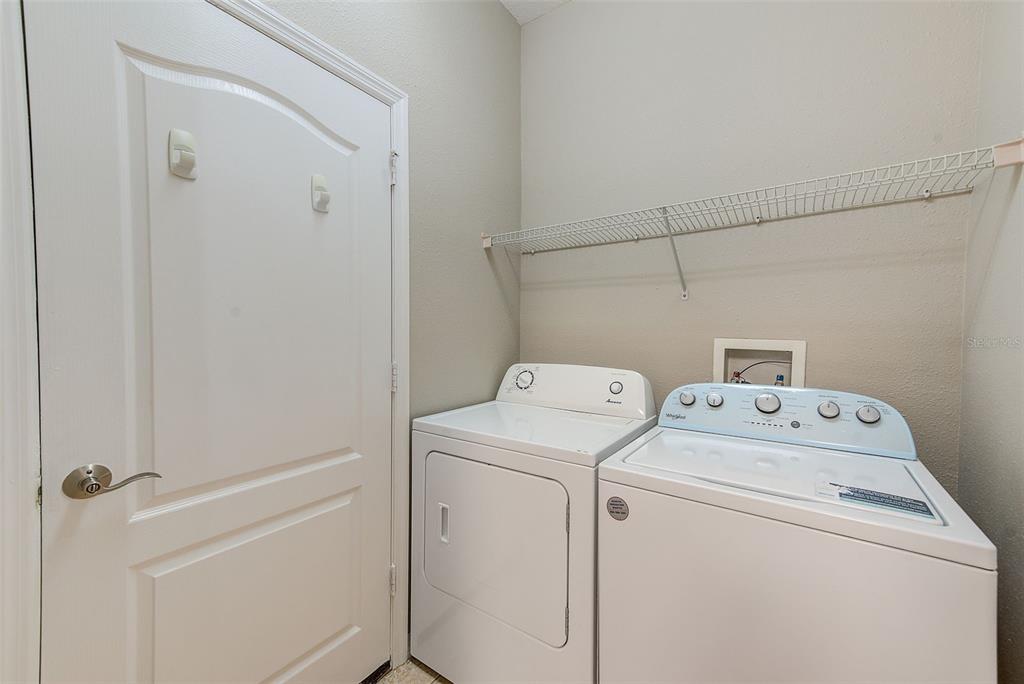 20306 Oak Key Court Tampa, FL 33647 - Photo 21 of 46 a utility room with dryer and washer