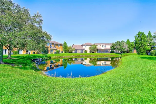 a view of a house with a big yard