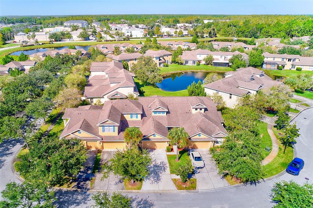 20306 Oak Key Court Tampa, FL 33647 - Photo 41 of 46 an aerial view of residential houses with outdoor space and parking