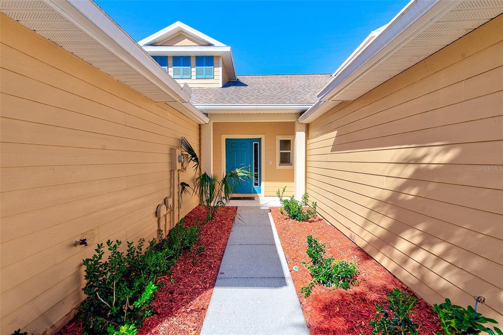 20306 Oak Key Court Tampa, FL 33647 - Photo 7 of 46 a front view of a house with a yard
