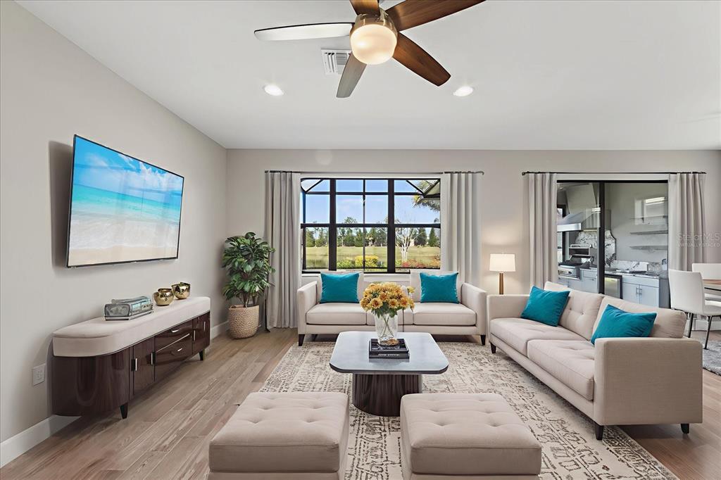 6745 Chester Trail Bradenton, FL 34202 - Photo 25 of 95 a living room with furniture and a large window