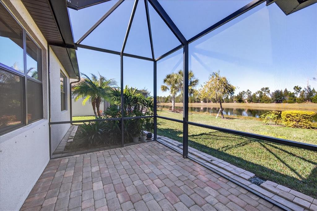 6745 Chester Trail Bradenton, FL 34202 - Photo 45 of 95 a view of a balcony with lake view and a potted plant