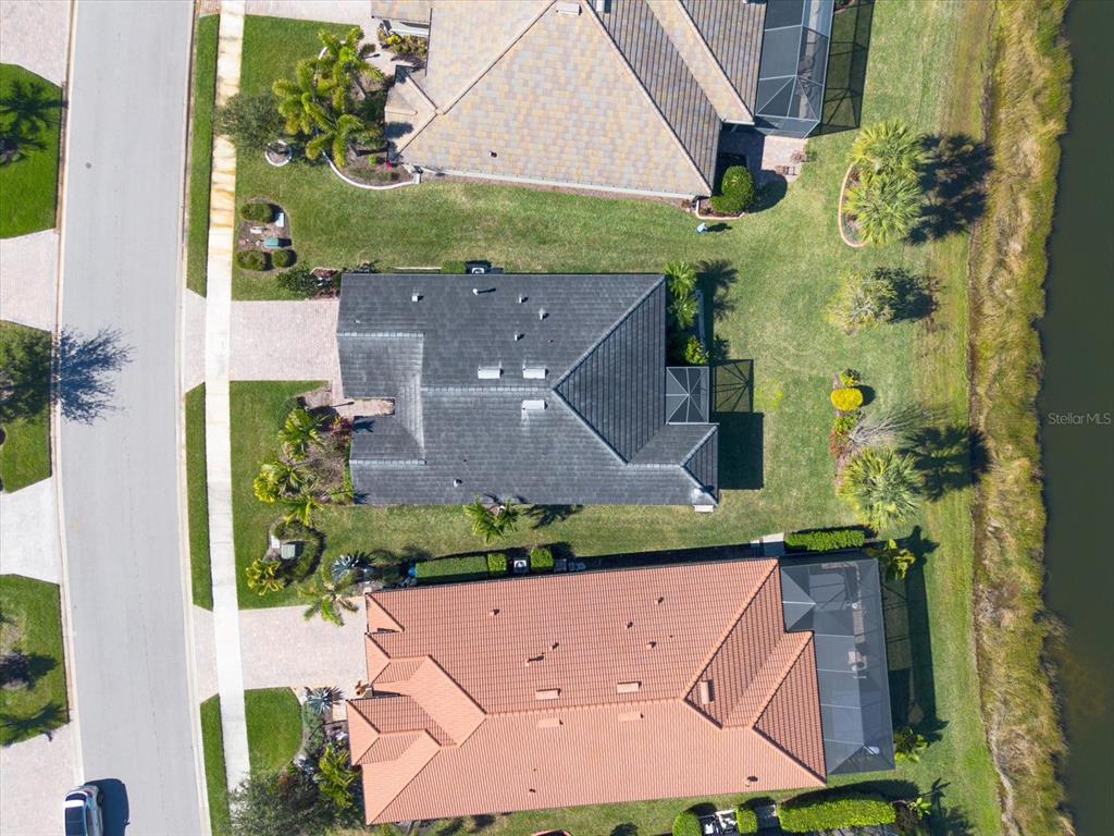 6745 Chester Trail Bradenton, FL 34202 - Photo 58 of 95 an aerial view of a house with a yard