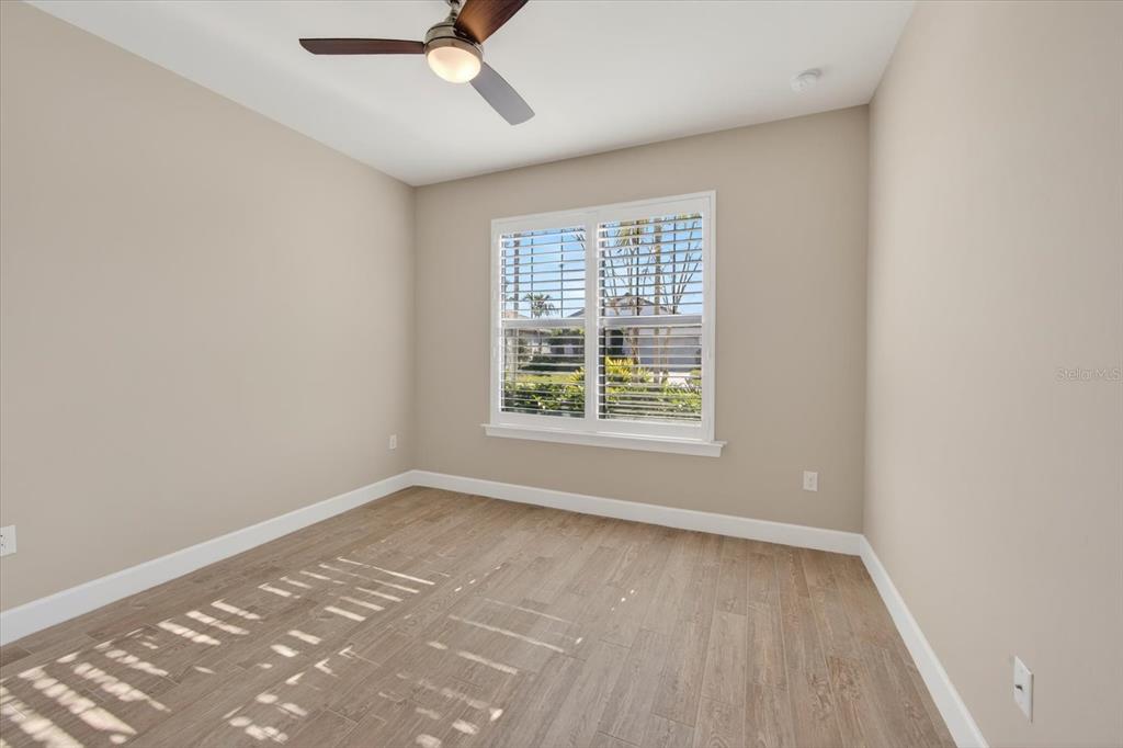 6745 Chester Trail Bradenton, FL 34202 - Photo 6 of 95 a view of an empty room with a window