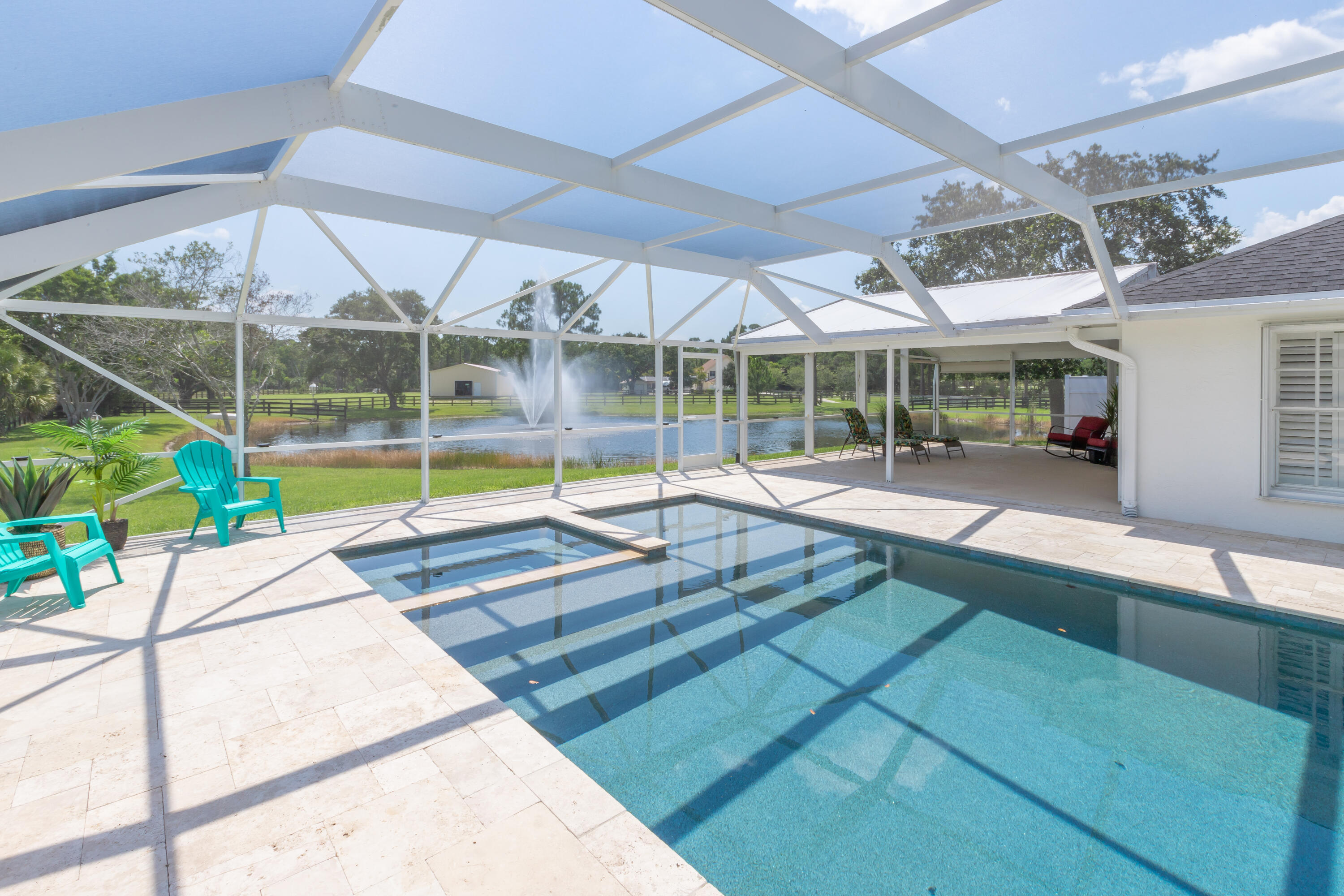 13230 Running Water Road Palm Beach Gardens, FL 33418 - Photo 14 of 32 a view of a backyard