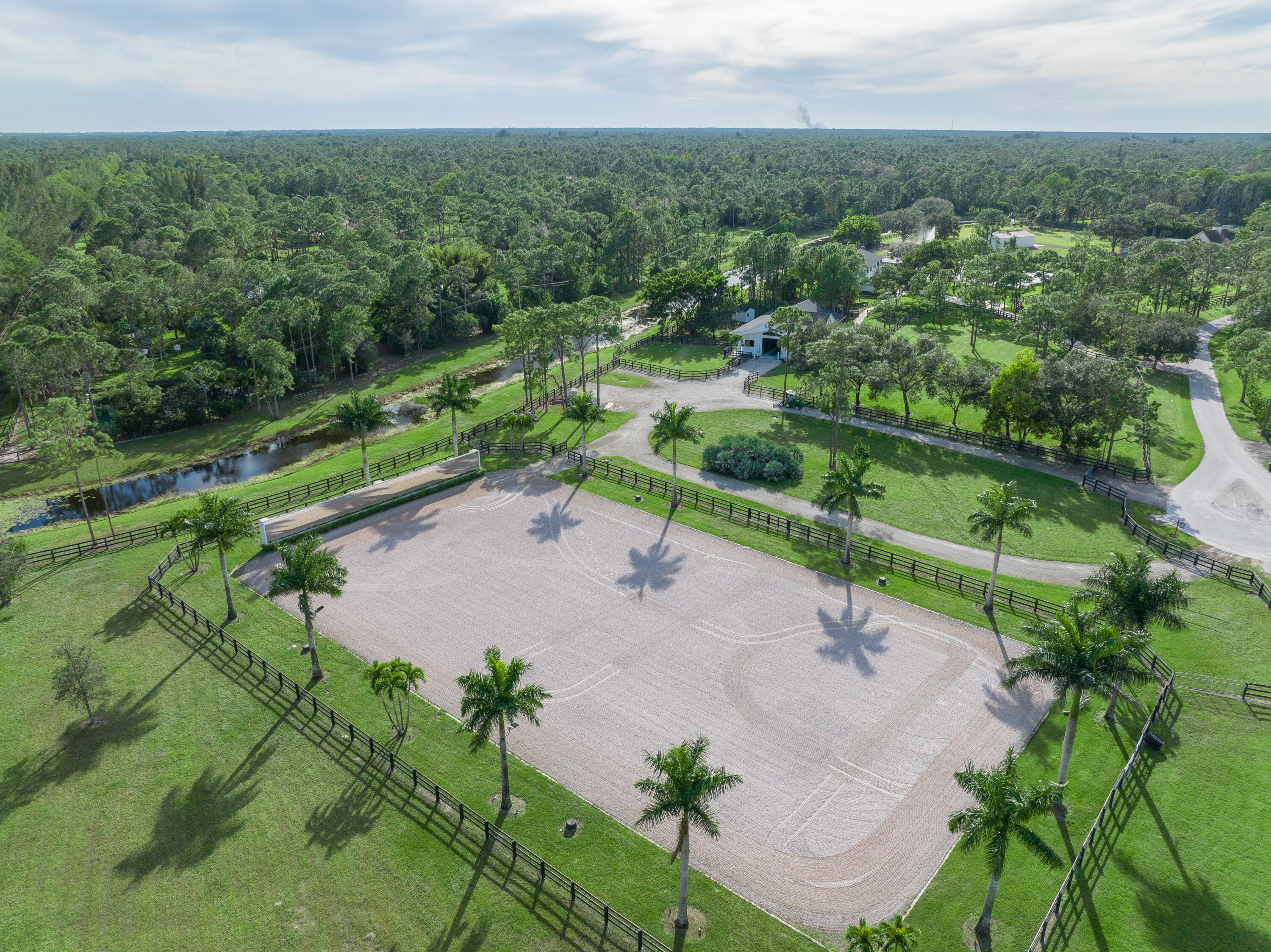 13230 Running Water Road Palm Beach Gardens, FL 33418 - Photo 17 of 32 an aerial view of a yard with a yard