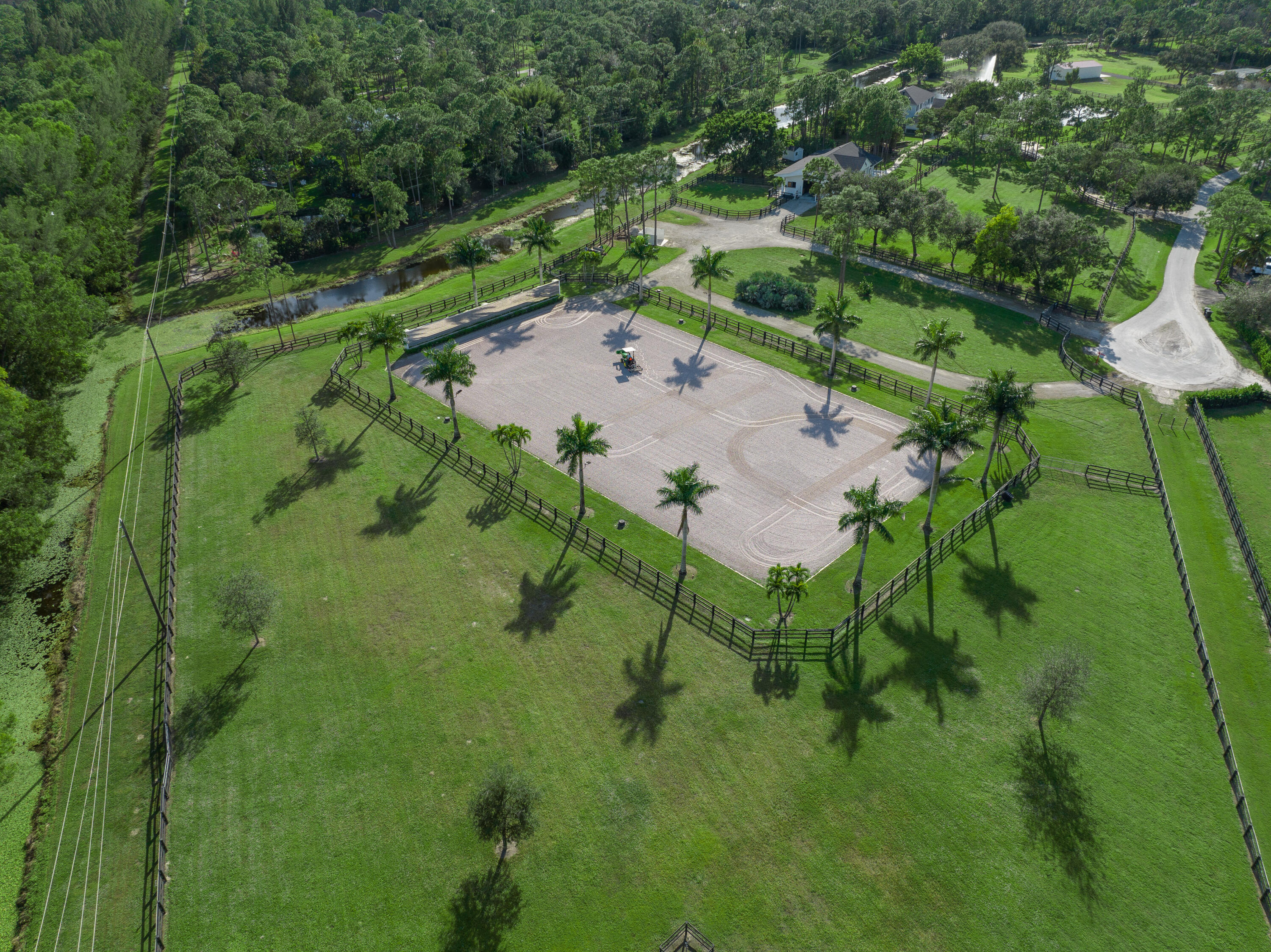 13230 Running Water Road Palm Beach Gardens, FL 33418 - Photo 21 of 32 a view of a garden with a plants