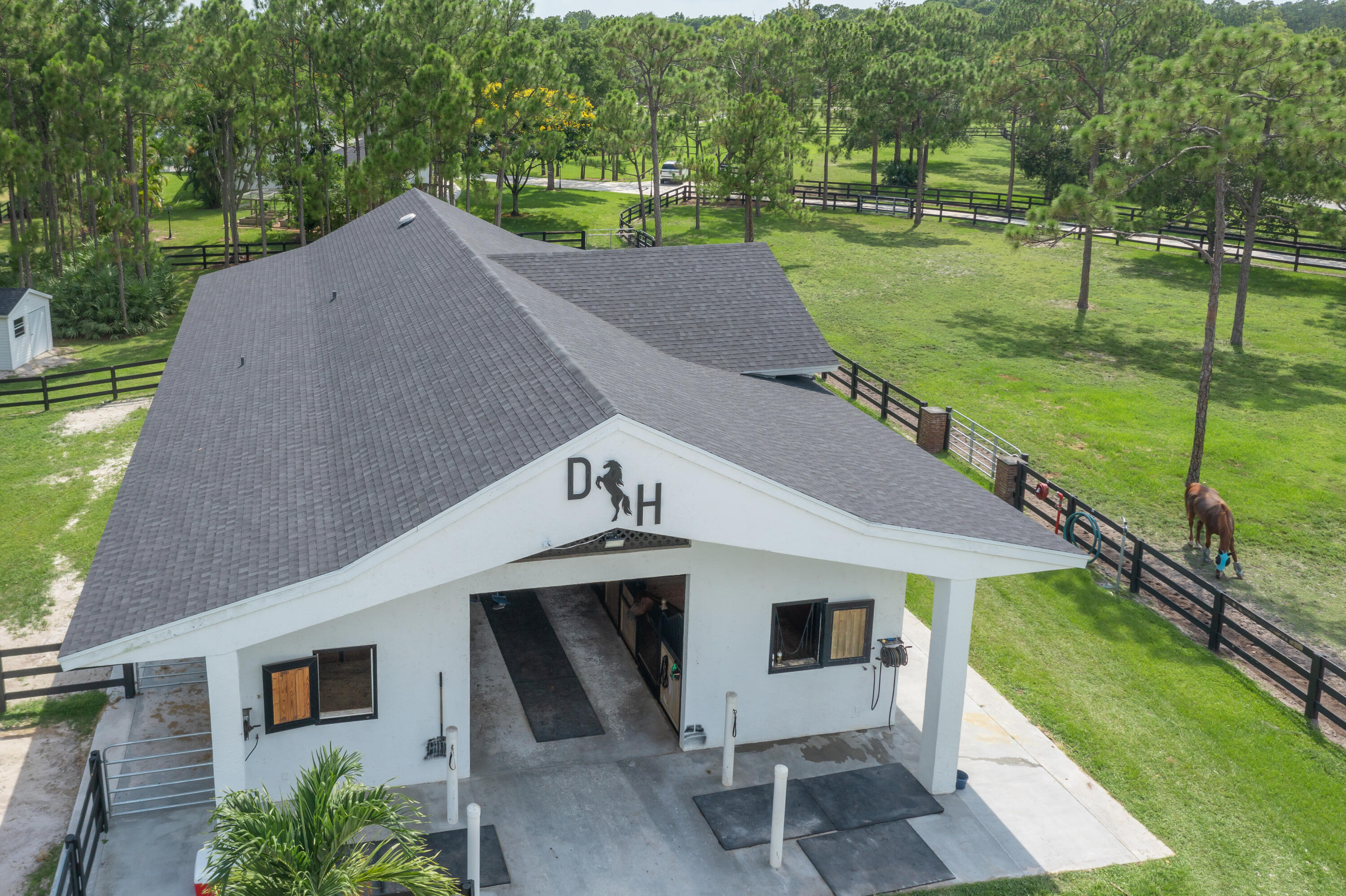 13230 Running Water Road Palm Beach Gardens, FL 33418 - Photo 24 of 32 a view of a house with a yard
