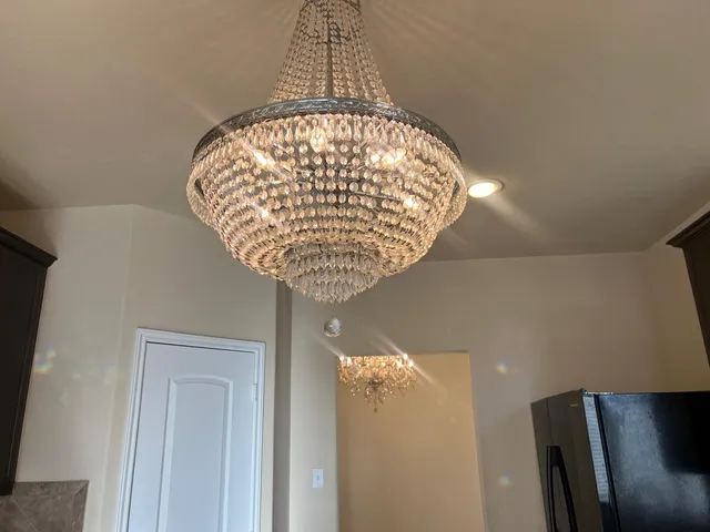 a kitchen with granite countertop a stove and a microwave