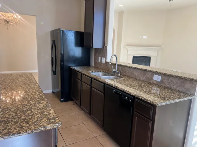 a view of a kitchen and window