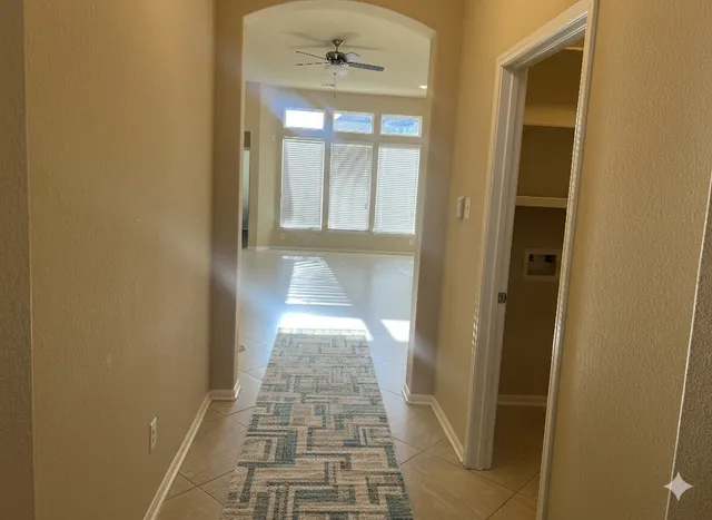 a view of a bathroom from the hallway