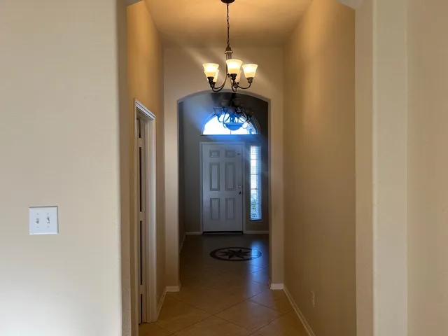 a bathroom with a shower and a sink