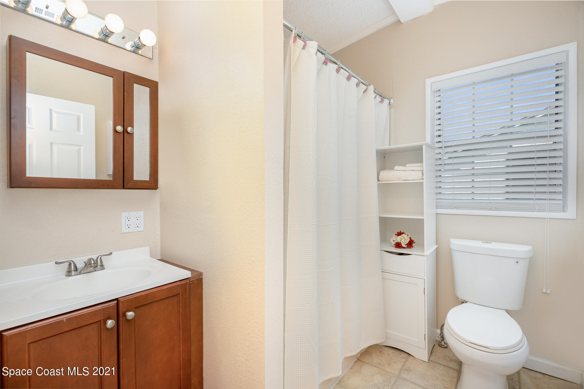 7050 Bismark Road Cocoa, FL 32927 - Photo 12 of 22 Guest Bathroom