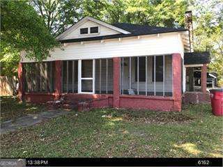 1803 Rocky Creek Road Macon, GA 31206 - Photo 1 of 10 a view of a house with a yard and tree
