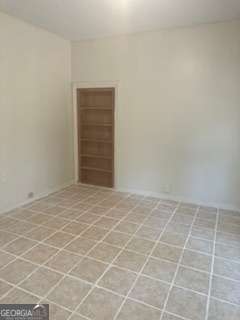 1803 Rocky Creek Road Macon, GA 31206 - Photo 6 of 10 a view of an empty room with staircase