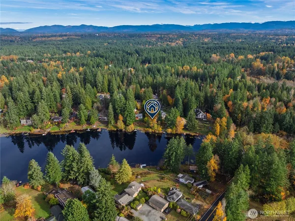 an aerial view of a town with couple of houses