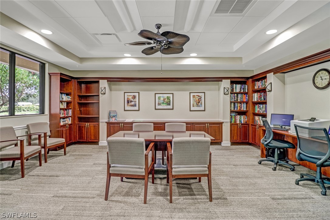 14101 Brant Point Circle, Unit 3303 Fort Myers, FL 33919 - Photo 26 of 30 a view of a livingroom with furniture and a bookshelf