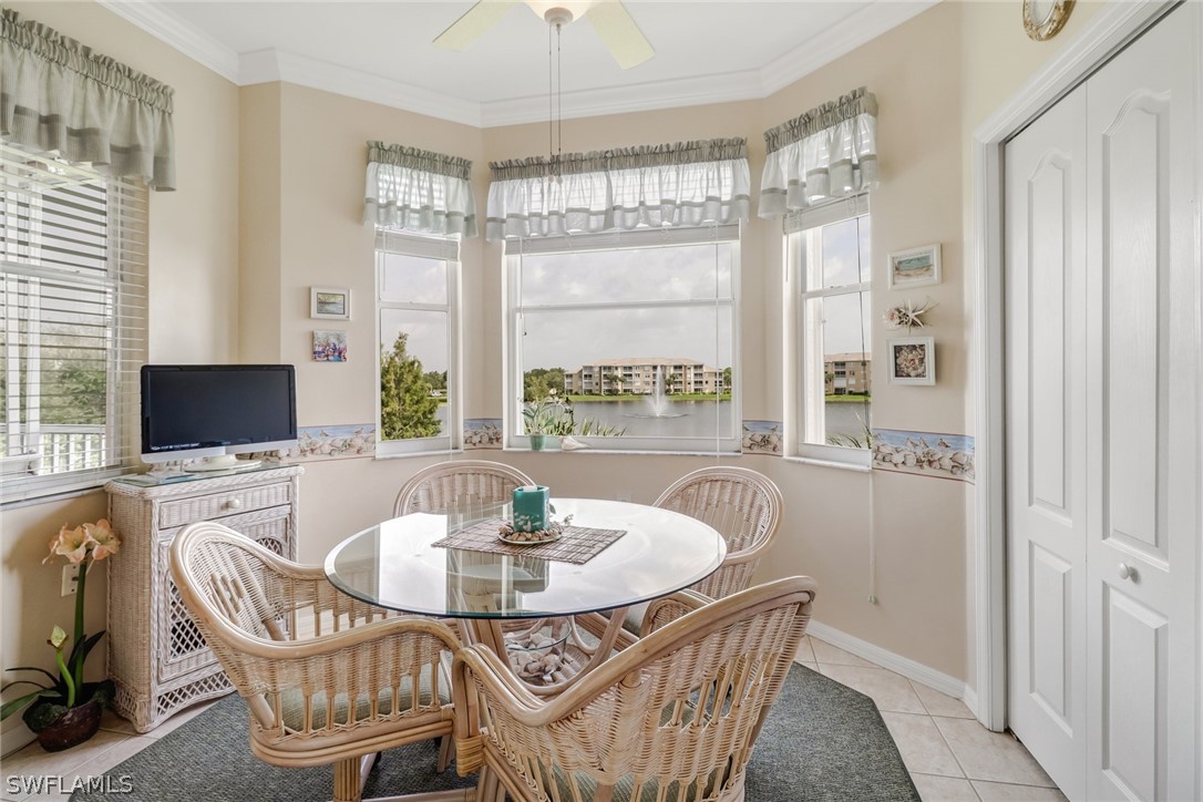 14101 Brant Point Circle, Unit 3303 Fort Myers, FL 33919 - Photo 6 of 30 a dining room with furniture and window