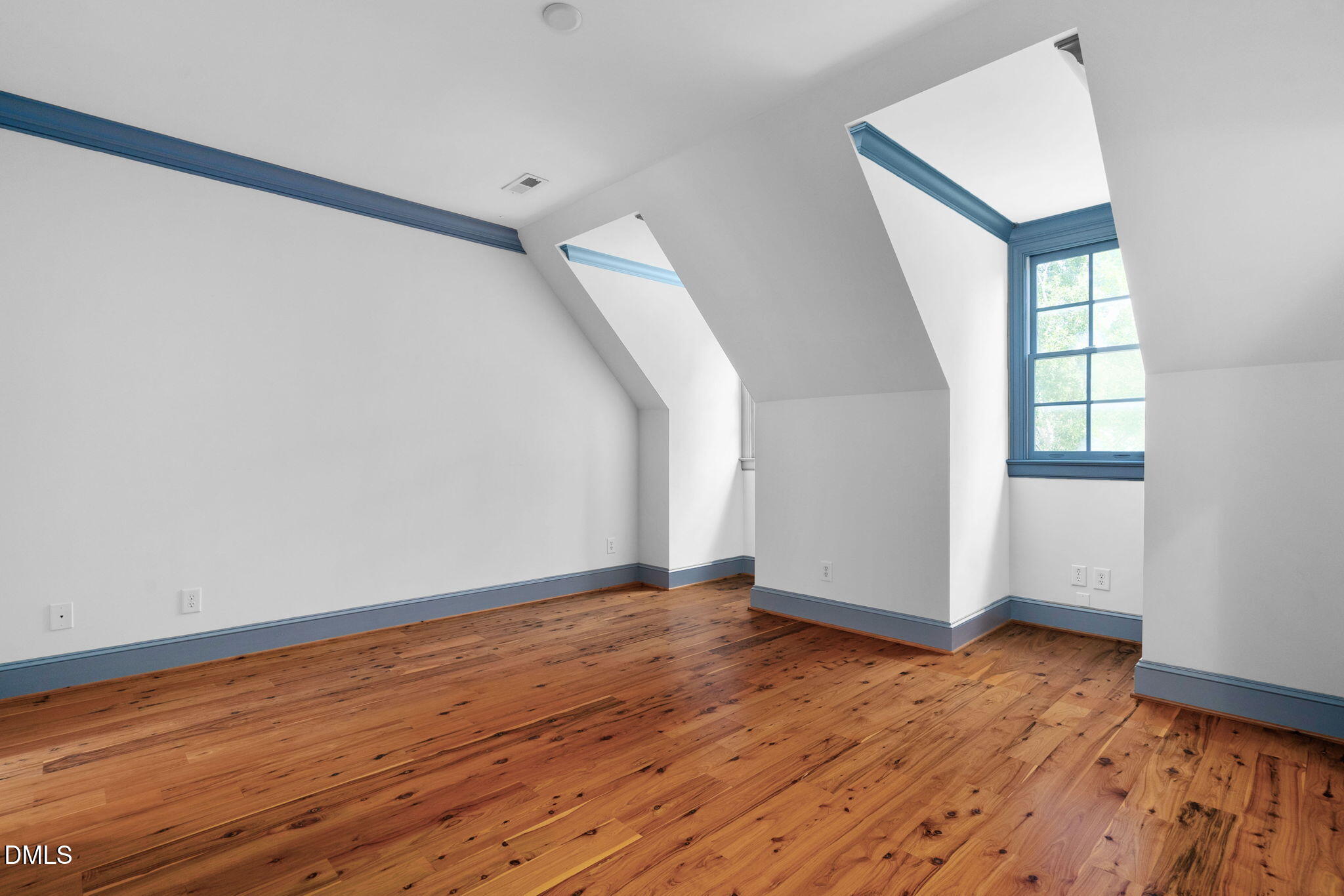1505 Chester Road Raleigh, NC 27608 - Photo 50 of 80 an empty room with wooden floor and windows