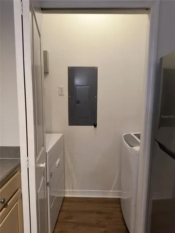 a bathroom with a sink and glass door