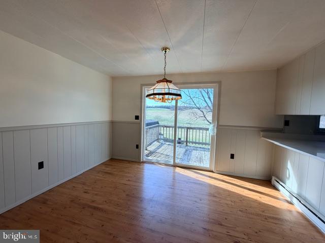 190 Bachmans Valley Road Westminster, MD 21158 - Photo 12 of 33 wooden floor in an empty room with a window
