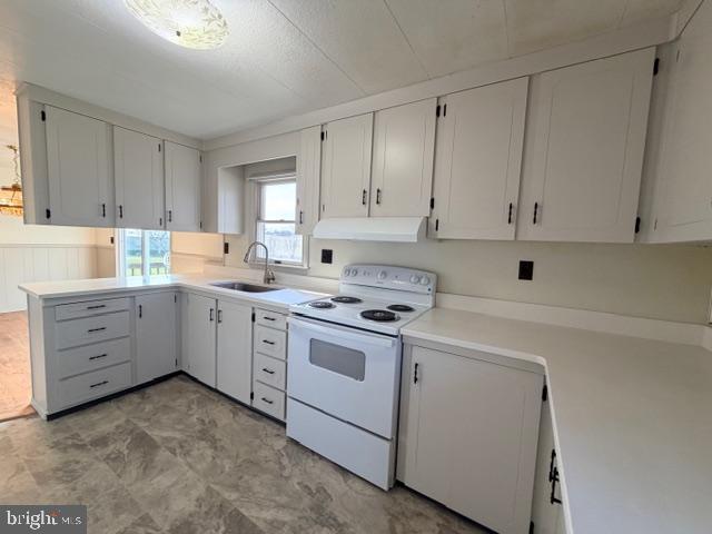 190 Bachmans Valley Road Westminster, MD 21158 - Photo 14 of 33 a kitchen with cabinets appliances a sink and a window