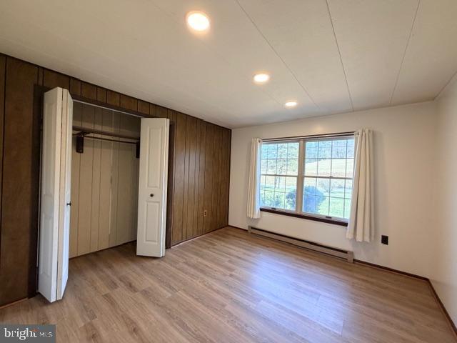 190 Bachmans Valley Road Westminster, MD 21158 - Photo 21 of 33 an empty room with wooden floor and windows