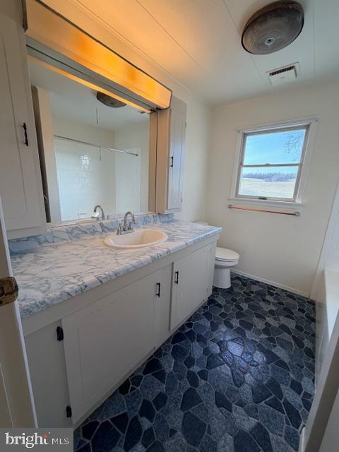 190 Bachmans Valley Road Westminster, MD 21158 - Photo 26 of 33 a bathroom with a granite countertop sink and mirror