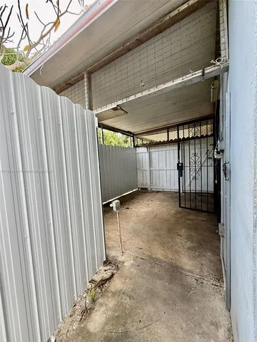 a kitchen with stainless steel appliances granite countertop a stove and a refrigerator