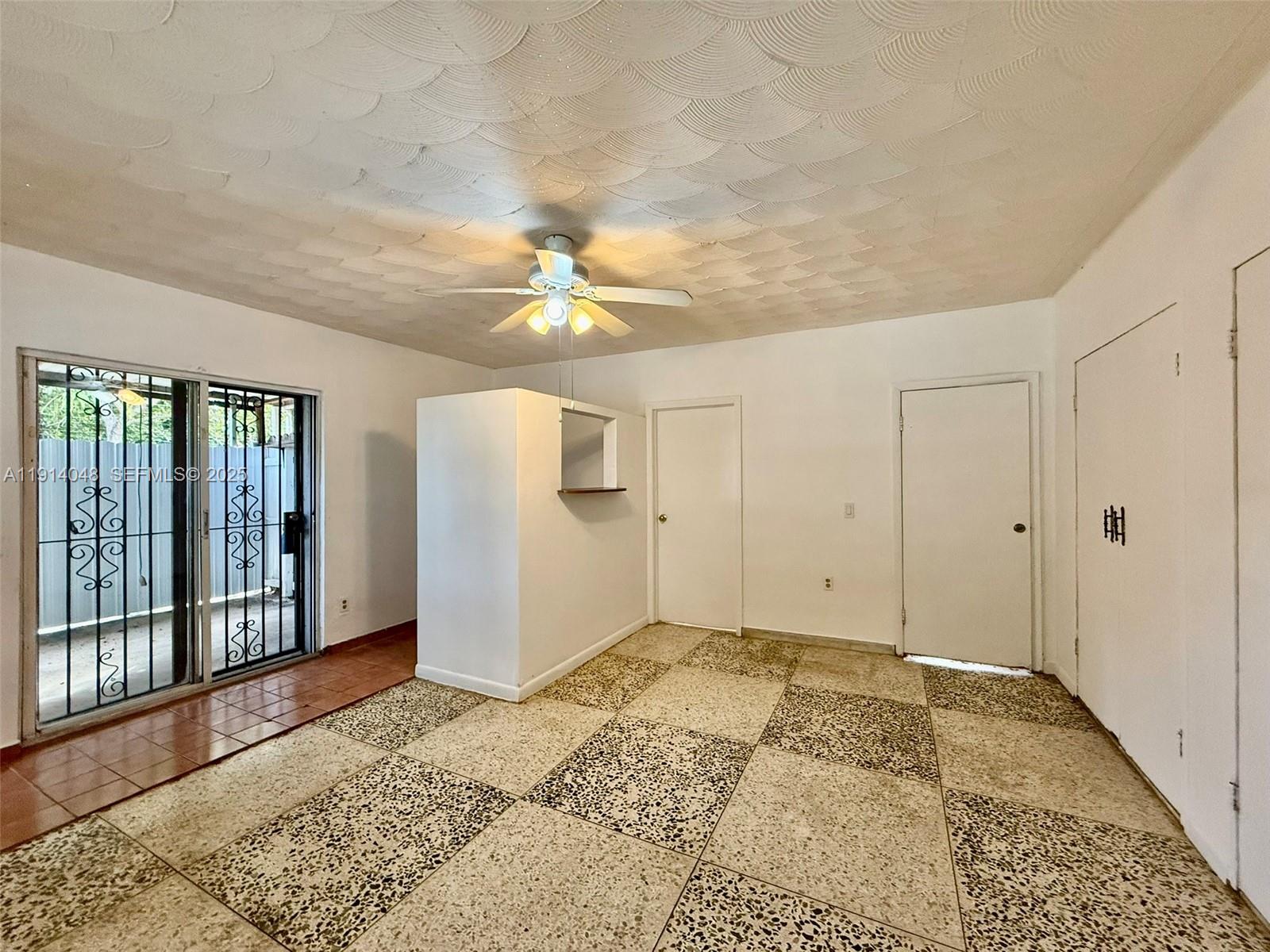 3000 Northwest 5th Street Miami, FL 33125 - Photo 28 of 54 a view of a livingroom with a chandelier