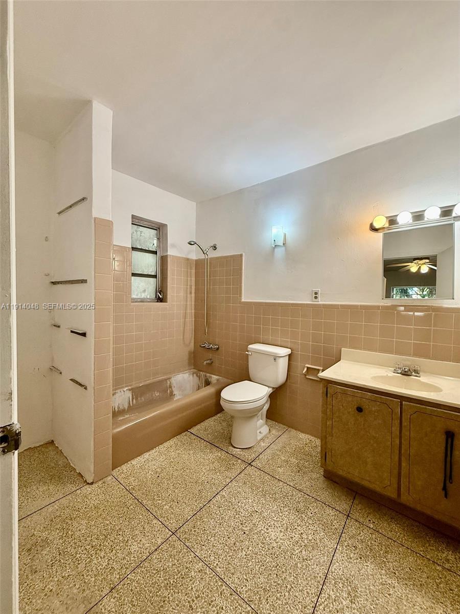 3000 Northwest 5th Street Miami, FL 33125 - Photo 30 of 54 a spacious bathroom with a bathtub shower sink and toilet