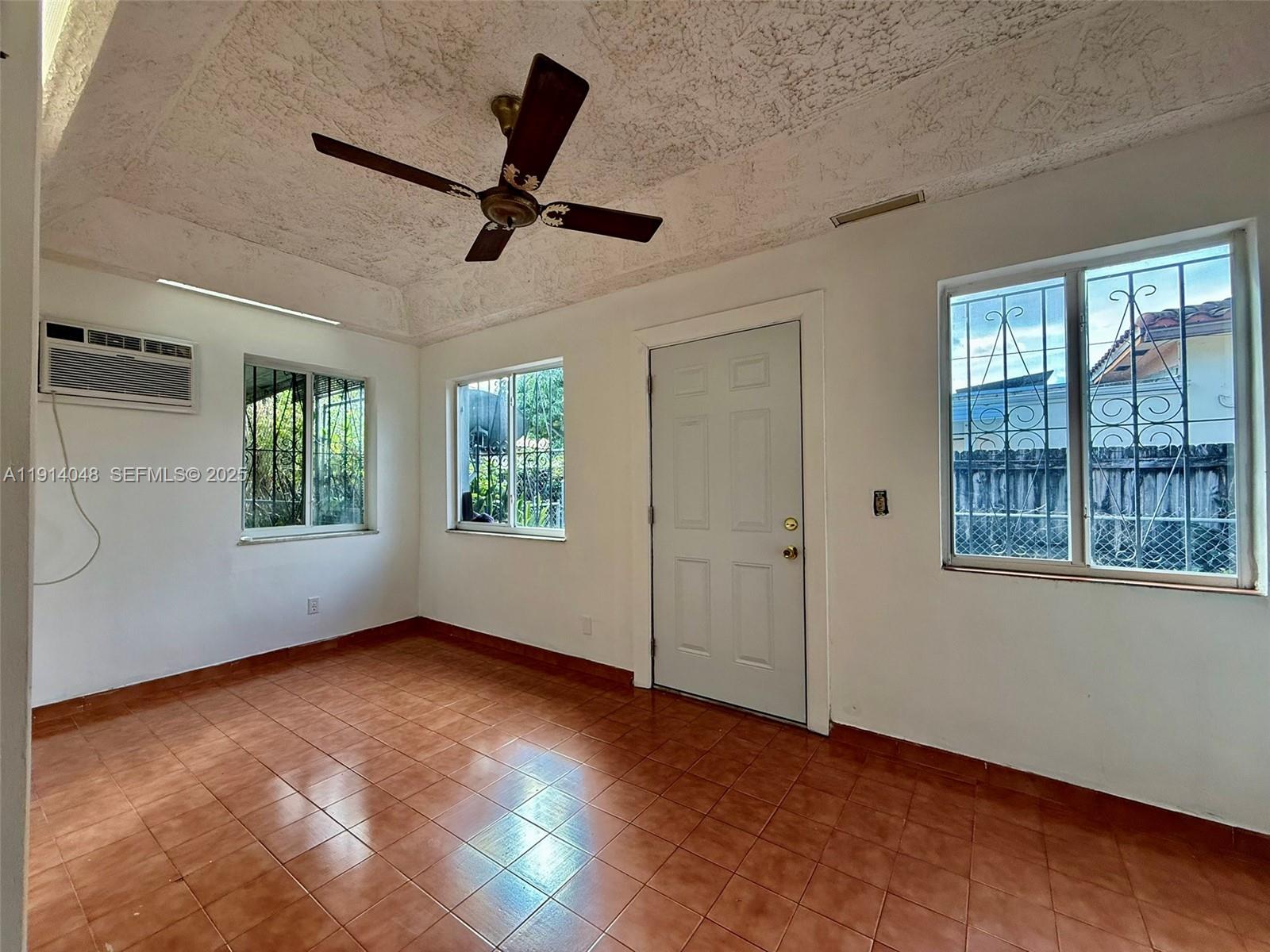 3000 Northwest 5th Street Miami, FL 33125 - Photo 34 of 54 a view of an empty room with a window
