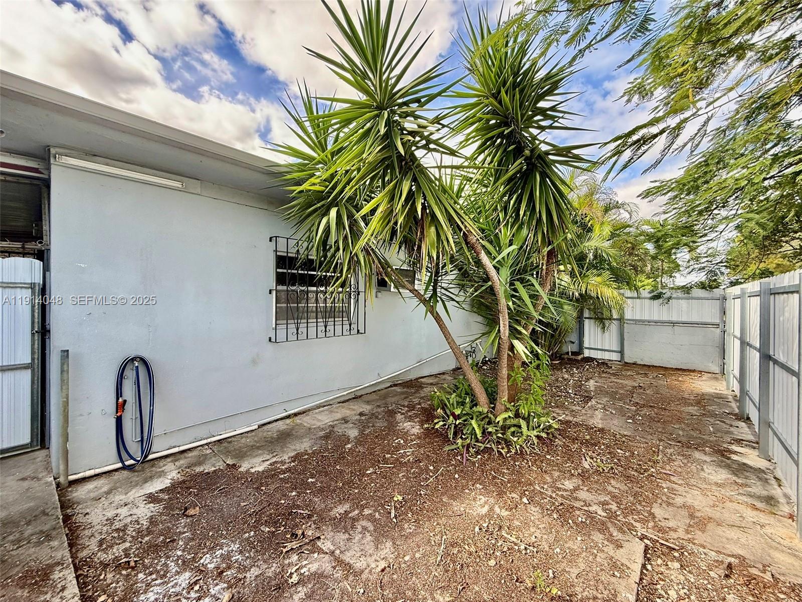 3000 Northwest 5th Street Miami, FL 33125 - Photo 41 of 54 a view of a backyard with a tree