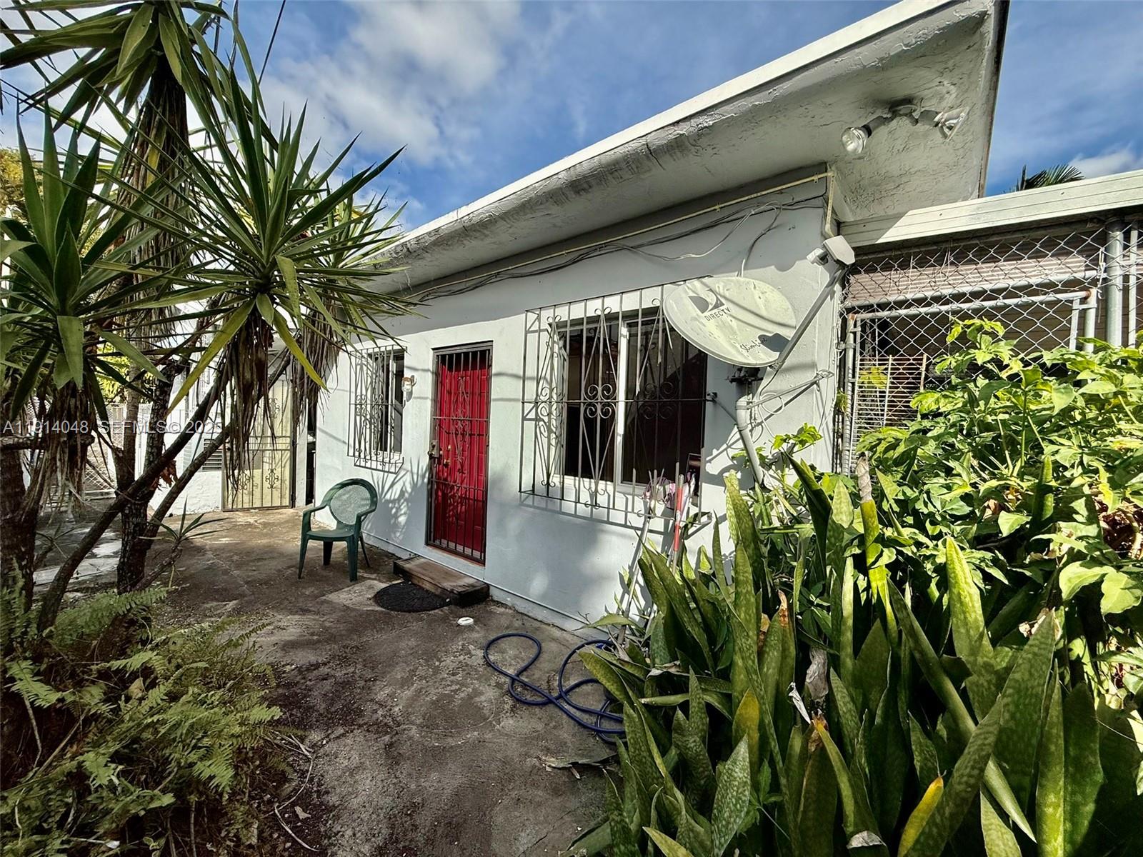 3000 Northwest 5th Street Miami, FL 33125 - Photo 49 of 54 a view of a house with a tree