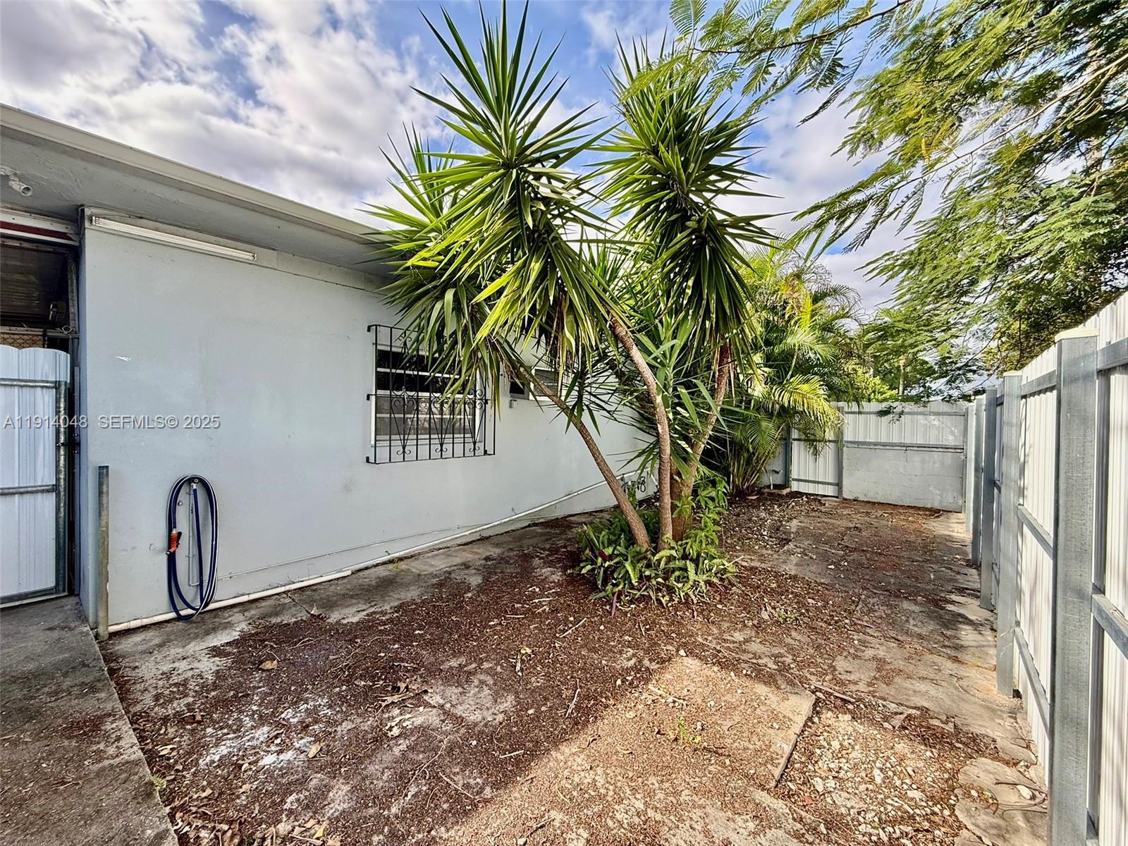 3000 Northwest 5th Street Miami, FL 33125 - Photo 53 of 54 a view of a backyard with a tree
