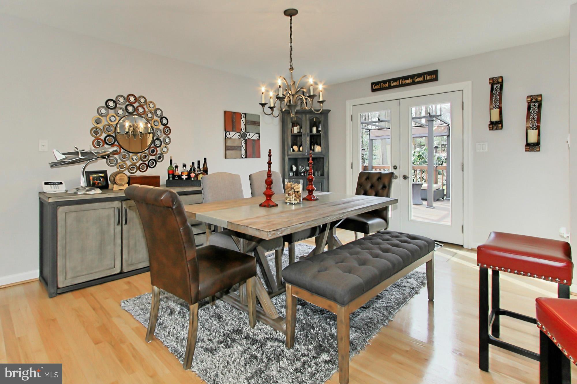 7376 Clifton Road Clifton, VA 20124 - Photo 8 of 25 Dining Room opens to beautiful backyard