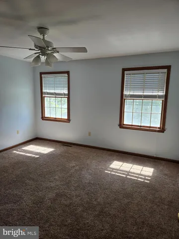 a view of a livingroom with a window