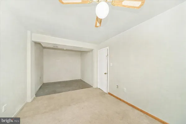 a view of a room with a staircase